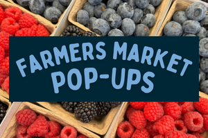 Vibrant photo of blueberries, raspberries, and blackberries set against the words "Farmers Market Pop-Ups"